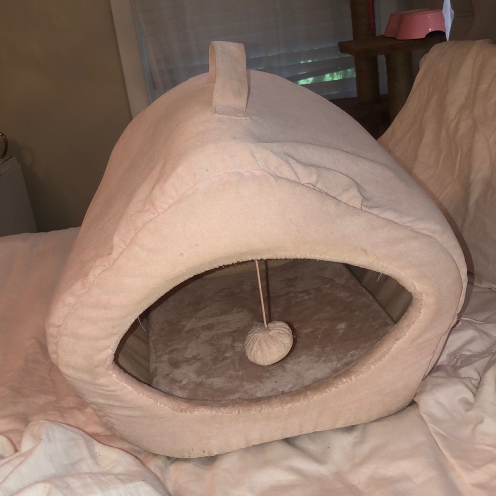 Pink covered cat bed